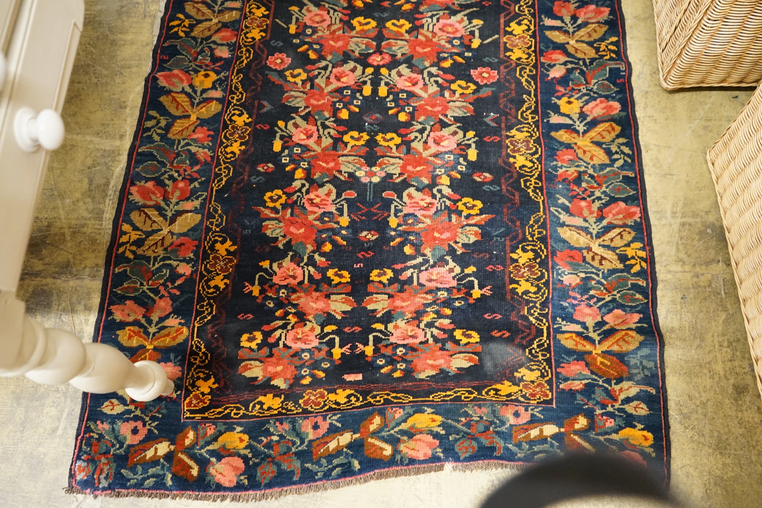 A Kirman style blue ground floral rug, 160 x 105cm